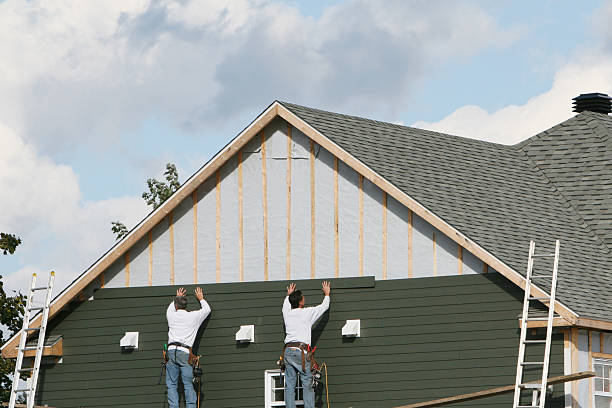Professional Siding Contractor technician working in Auburn, IN